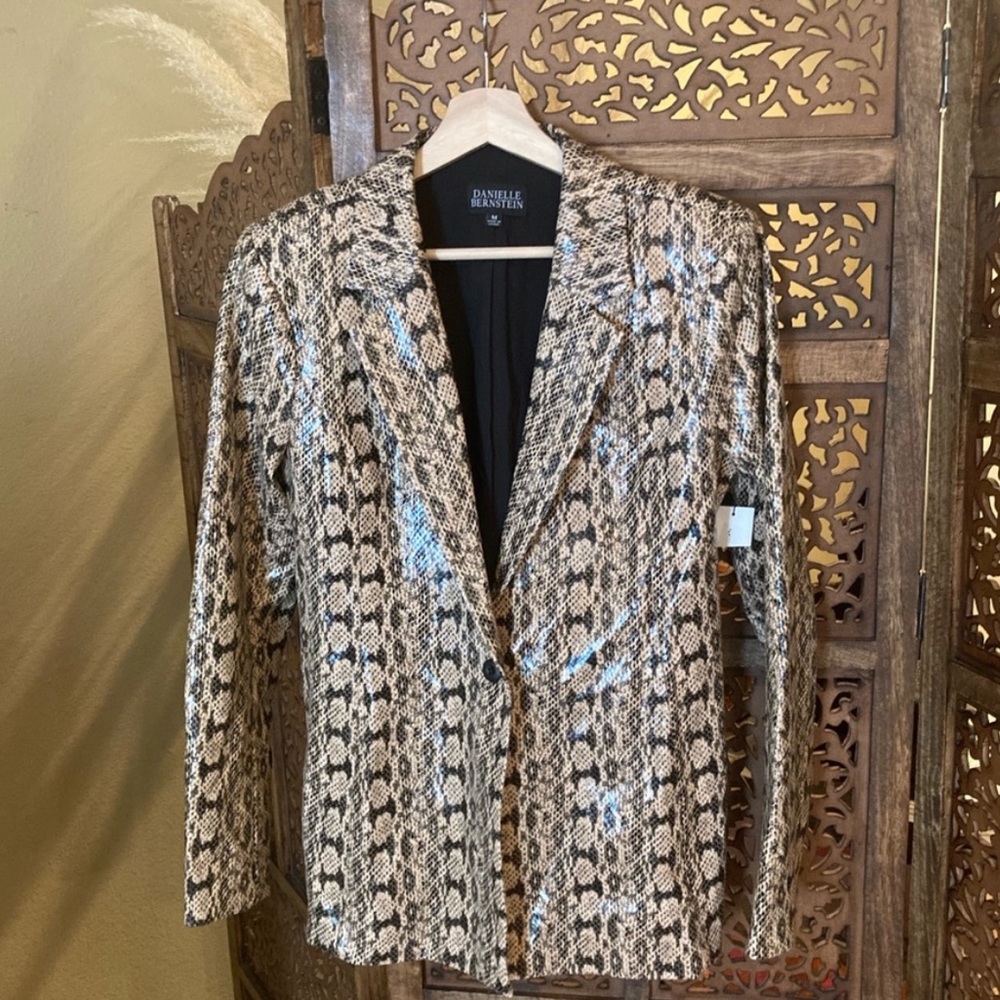 Danielle We wore what snake blazer!